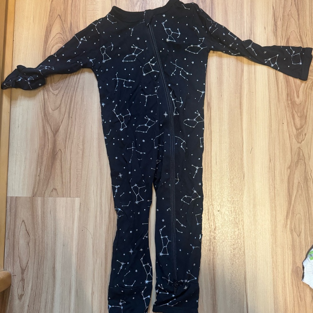Kyte BABY midnight constellation print zippered romper.